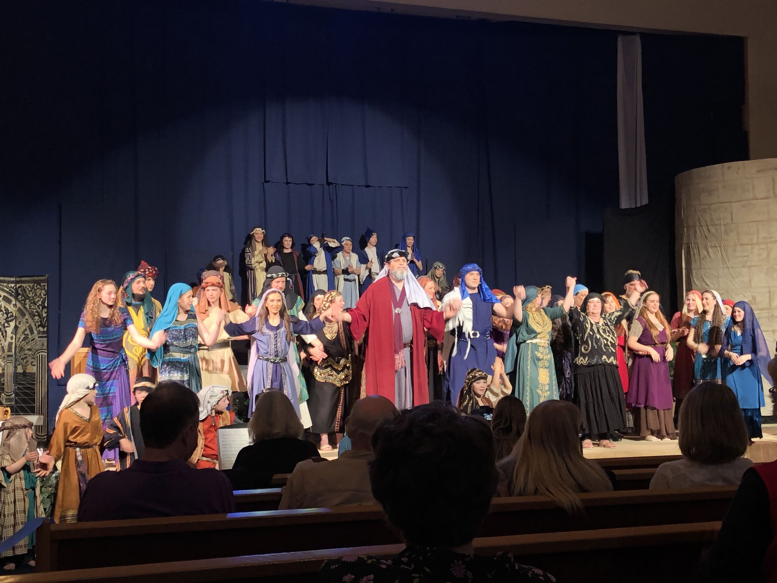 The company of The Inheritance on stage in 2021, an MCO Productions musical