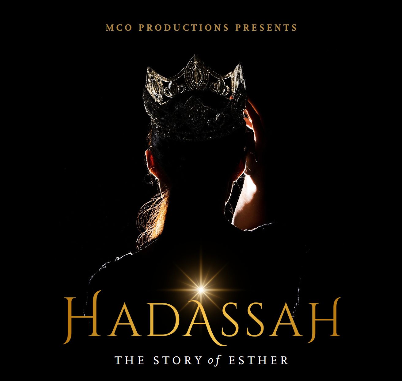 A silhouetted performer wearing an ornate crown and golden-accented costume stands against a black background, illuminated by warm golden lighting that highlights the crown's jeweled details and the performer's draped fabric.